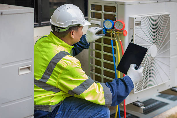 Professional Hvac technician working in Houston, AL